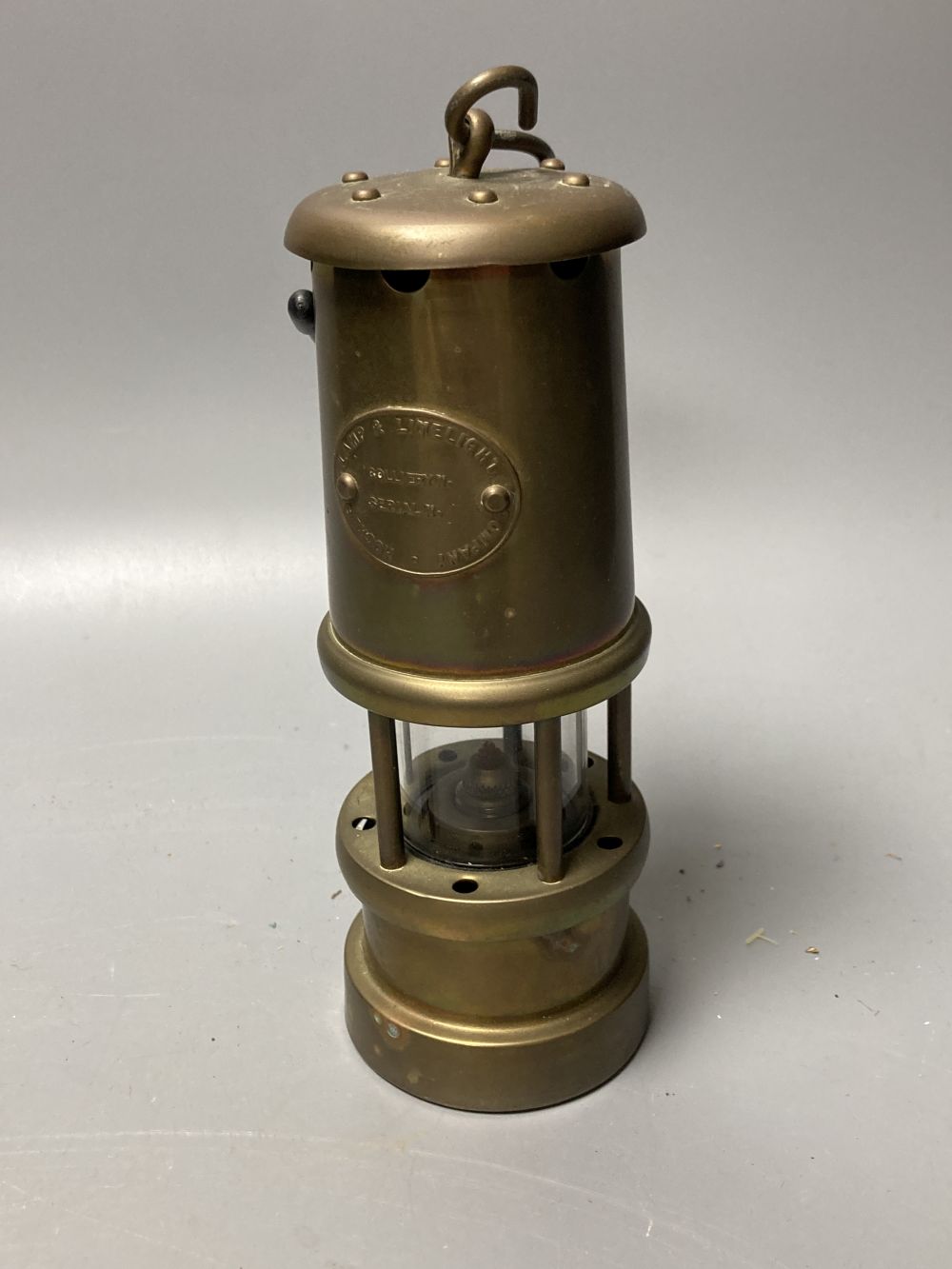 Three brass and chrome miners lamps, 25cm high